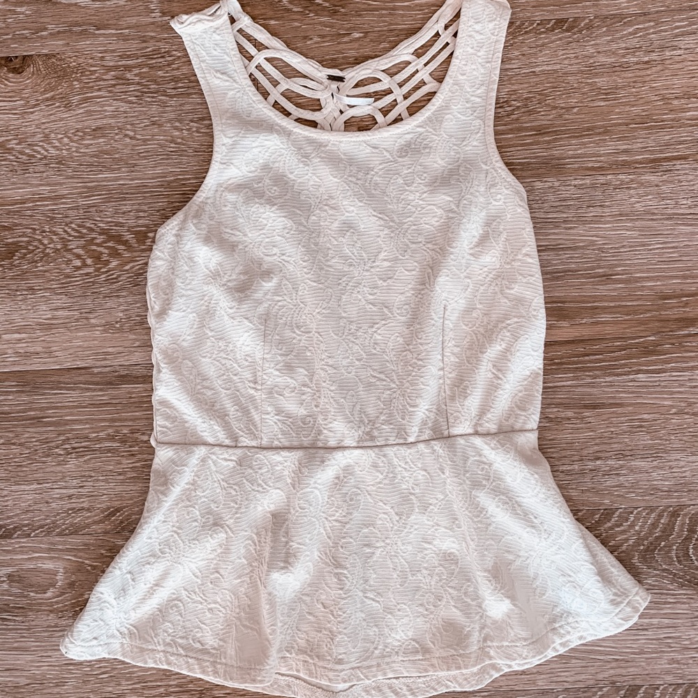 Peplum top with open back
